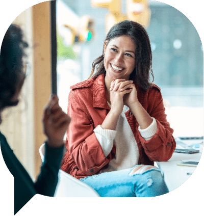 Smiling Woman in a Meeting