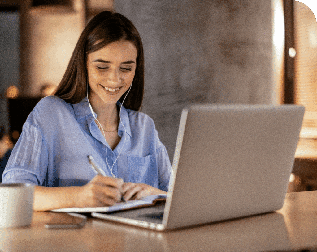 Woman Writing in a Notebook
